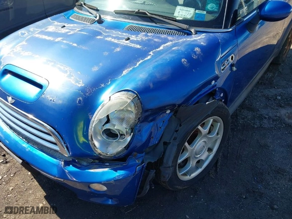 2006 MINI Cooper Convertible S with VIN WMWRH33506TK59570, listed as a IAAI auction lot 41598815 with NaN miles. Bid and sale history available at carsss.com. Image 6.