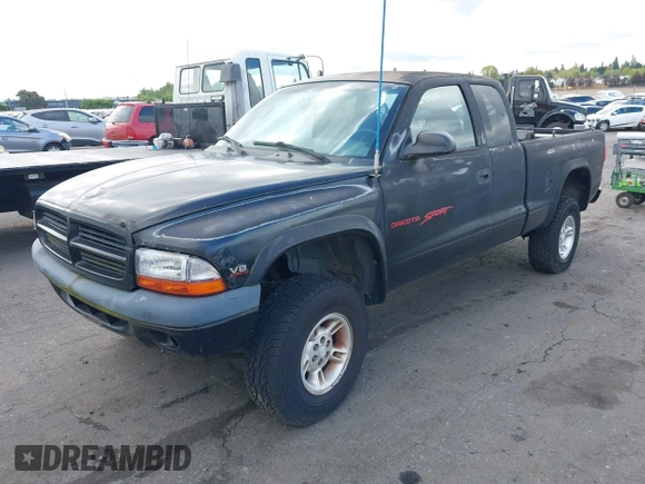 1999 Dodge Dakota SLT with VIN 1B7GG22YXXS229633, listed as a IAAI auction lot 42088939 with 148,049 mi miles and . Bid and sale history available at carsss.com. Image 2.