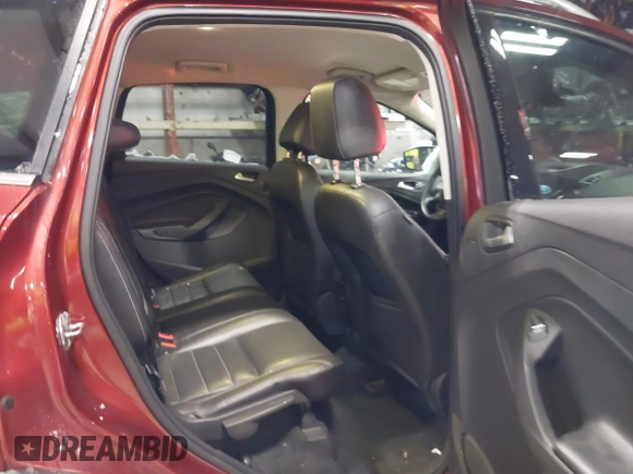 2016 Ford Escape Titanium with VIN 1FMCU9JX6GUB57497, listed as a IAAI auction lot 41375019 with 1 mi miles. Bid and sale history available at carsss.com. Image 8.