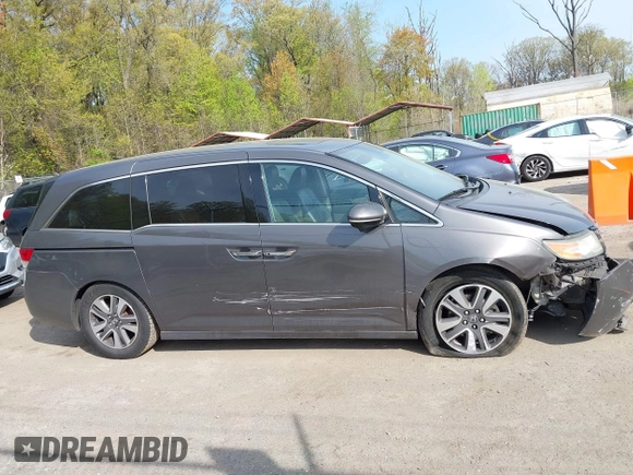 2014 Honda Odyssey Touring with VIN 5FNRL5H92EB073085, listed as a IAAI auction lot 42065913 with 120,834 mi miles and . Bid and sale history available at DreamBid. Image 13.