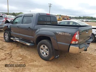 2013 Toyota Tacoma z VIN 5TFLU4EN2DX082131, wystawiony jako IAAI lot #41912420 z przebiegiem 195 334 mil mil oraz . Historia ofert i sprzedaży dostępna na DreamBid. Obrazek 3.