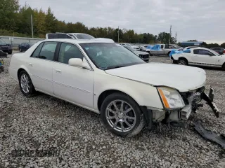 2007 Cadillac DTS Performance z VIN 1G6KD57907U171271, wystawiony jako Copart lot #79007574 z przebiegiem 147 504 mil mil oraz Szkoda całkowita • Salvage title. Historia ofert i sprzedaży dostępna na DreamBid. Obrazek 4.