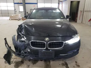 2017 BMW 3 Series 330i xDrive with VIN WBA8D9G30HNU65773, listed as a Copart auction lot 46899315 with 76,949 mi miles and Salvage Title. Bid and sale history available at carsss.com. Image 5.