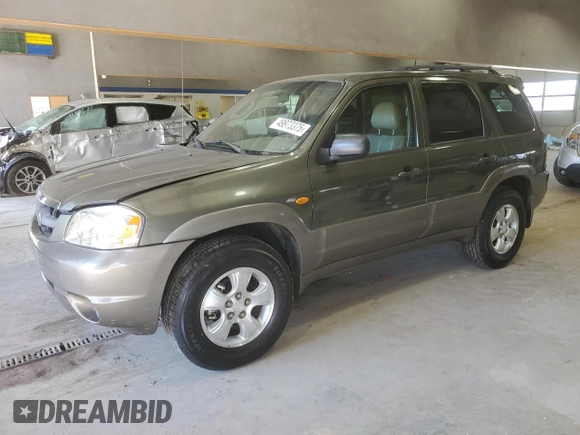 2002 Mazda Tribute LX with VIN 4F2YU09142KM39082, listed as a Copart auction lot 49973375 with 128,002 mi miles and Clean Title. Bid and sale history available at carsss.com. Image 1.