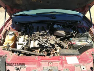2005 Ford Taurus SE with VIN 1FAFP53U85A129306, listed as a IAAI auction lot 40585457 with 329,569 mi miles. Bid and sale history available at carsss.com. Image 10.