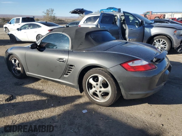 2006 Porsche Boxster с VIN WP0CA29816U710539, выставлен на аукционе Copart как лот 80785334 с пробегом 104 041 миль миль и Списание • Salvage title. История ставок и продаж доступна на DreamBid. Изображение 2.