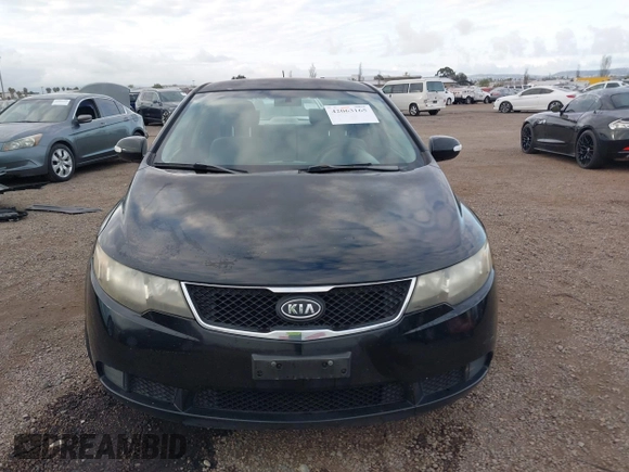 2010 Kia Forte EX with VIN KNAFU4A28A5050734, listed as a IAAI auction lot 42063165 with 179,284 mi miles. Bid and sale history available at carsss.com. Image 12.