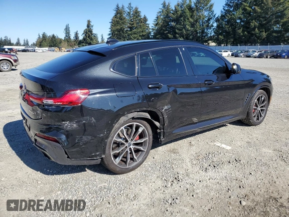2021 BMW X4 M40i с VIN 5UX2V5C01M9F24036, выставлен на аукционе Copart как лот 74834364 с пробегом 38 185 миль миль и Списание • Salvage title. История ставок и продаж доступна на DreamBid. Изображение 3.