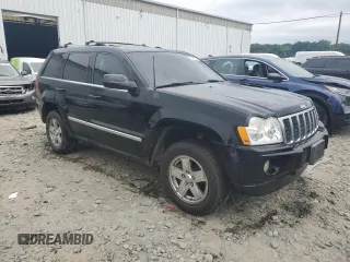 2007 Jeep Grand Cherokee Overland with VIN 1J8HR68227C651830, listed as a Copart auction lot 62403725 with 147,827 mi miles and Salvage title. Bid and sale history available at DreamBid. Image 4.
