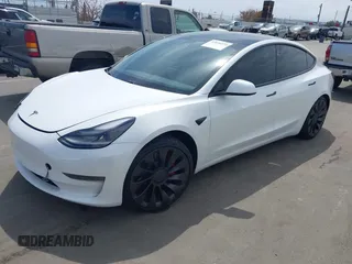 2021 Tesla Model 3 Performance with VIN 5YJ3E1EC2MF084594, listed as a IAAI auction lot 42030339 with 43,215 mi miles and . Bid and sale history available at DreamBid. Image 19.