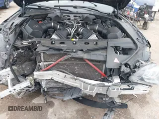 2014 BMW M6 z VIN WBSLZ9C58ED651156, wystawiony jako IAAI lot #41526192 z przebiegiem 90 642 mil mil oraz . Historia ofert i sprzedaży dostępna na DreamBid. Obrazek 10.