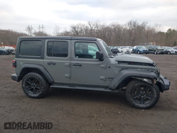 2021 Jeep Wrangler Unlimited Sport S with VIN 1C4HJXDG5MW614688, listed as a IAAI auction lot 41678964 with 89,309 mi miles. Bid and sale history available at carsss.com. Image 13.