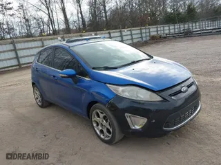 2011 Ford Fiesta SES with VIN 3FADP4FJ0BM113781, listed as a IAAI auction lot 41733662 with 191,092 mi miles. Bid and sale history available at carsss.com. Image 1.