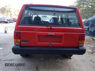 1996 Jeep Cherokee Sport with VIN 1J4FJ68S8TL285995, listed as a Copart auction lot 73333574 with 187,429 mi miles and Salvage Title. Bid and sale history available at carsss.com. Image 6.