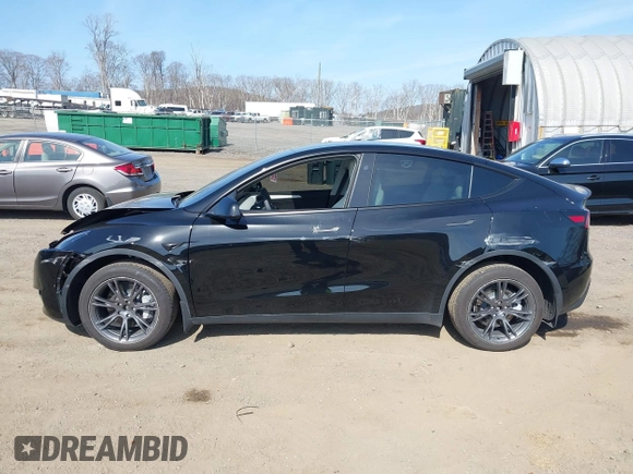 2025 Tesla Model Y Long Range with VIN 7SAYGDEEXSF267888, listed as a IAAI auction lot 41807129 with 3,002 mi miles and . Bid and sale history available at DreamBid. Image 14.