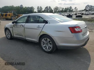 2010 Ford Taurus Limited with VIN 1FAHP2FWXAG149570, listed as a Copart auction lot 59150085 with 201,632 mi miles and Salvage title. Bid and sale history available at DreamBid. Image 2.