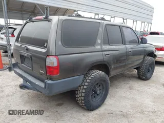 1998 Toyota 4Runner SR5 z VIN JT3GN86R3W0082047, wystawiony jako IAAI lot #42030018 z przebiegiem 259 894 mil mil oraz . Historia ofert i sprzedaży dostępna na DreamBid. Obrazek 4.