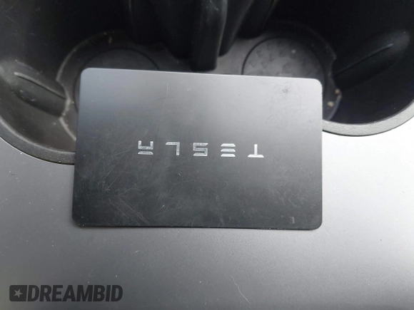 2022 Tesla Model Y Long Range with VIN 7SAYGDEEXNF424856, listed as a IAAI auction lot 41059718 with 44,439 mi miles and . Bid and sale history available at carsss.com. Image 11.