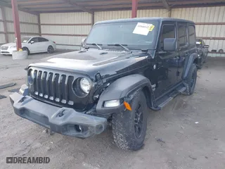 2020 Jeep Wrangler Unlimited Sport Altitude with VIN 1C4HJXDGXLW329841, listed as a IAAI auction lot 41060142 with 57,243 mi miles. Bid and sale history available at carsss.com. Image 6.