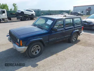 2001 Jeep Cherokee Sport with VIN 1J4FF48S91L513926, listed as a IAAI auction lot 42671363 with 234,233 mi miles and . Bid and sale history available at DreamBid. Image 2.