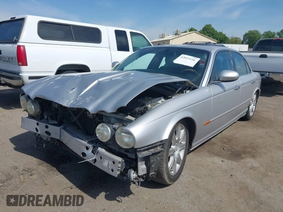 2004 Jaguar XJ 8 with VIN SAJEA71C74SG11470, listed as a IAAI auction lot 42032116 with 209,821 mi miles and . Bid and sale history available at DreamBid. Image 21.