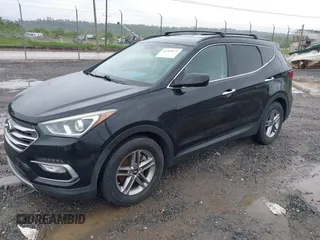 2017 Hyundai Santa Fe 2.4L z VIN 5NMZU3LB3HH011127, wystawiony jako IAAI lot #42369671 z przebiegiem 91 634 mil mil oraz . Historia ofert i sprzedaży dostępna na DreamBid. Obrazek 2.
