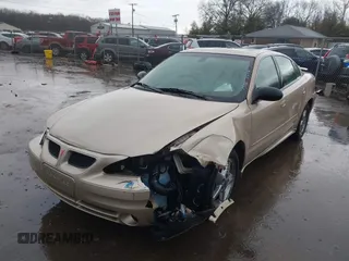 2003 Pontiac Grand Am SE1 with VIN 1G2NF52E03C327760, listed as a IAAI auction lot 41718054 with 156,173 mi miles. Bid and sale history available at carsss.com. Image 6.