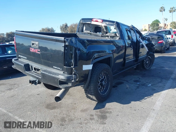 2019 GMC Sierra 2500HD Denali with VIN 1GT12SEYXKF222893, listed as a IAAI auction lot 41722342 with 114,613 mi miles. Bid and sale history available at carsss.com. Image 4.