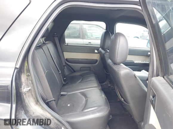 2011 Mercury Mariner Premier with VIN 4M2CN8HGXBKJ07489, listed as a IAAI auction lot 42574942 with 163,786 mi miles and . Bid and sale history available at DreamBid. Image 8.