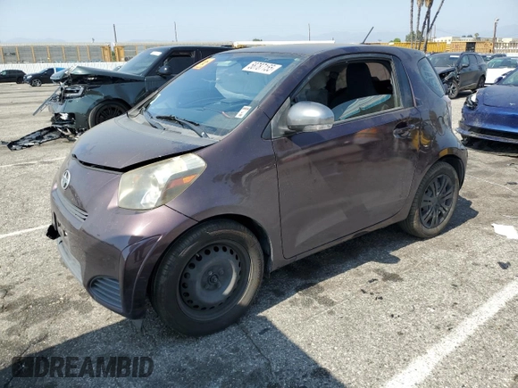 2013 Scion iQ with VIN JTNJJXB05DJ022305, listed as a Copart auction lot 58787155 with 136,046 mi miles and Salvage title. Bid and sale history available at DreamBid. Image 1.