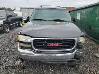 2005 GMC Yukon SLT z VIN 1GKEC13T35J119126, wystawiony jako Copart lot #47849455 z przebiegiem 301 785 mil mil oraz Szkoda całkowita • Salvage title. Historia ofert i sprzedaży dostępna na DreamBid. Obrazek 5.