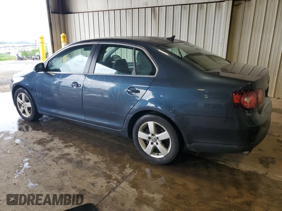2009 Volkswagen Jetta SE z VIN 3VWRZ71KX9M167334, wystawiony jako Copart lot #63056825 z przebiegiem 187 466 mil mil oraz Szkoda całkowita • Salvage title. Historia ofert i sprzedaży dostępna na DreamBid. Obrazek 2.