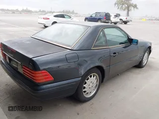 1996 Mercedes-Benz SL-Class with VIN WDBFA67F6TF131910, listed as a IAAI auction lot 41797208 with 93,122 mi miles. Bid and sale history available at carsss.com. Image 4.