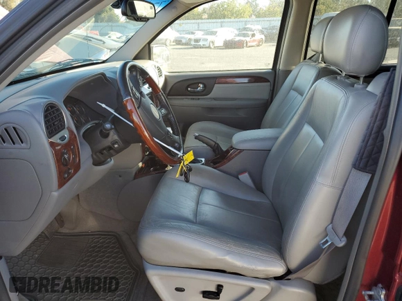 2007 GMC Envoy Denali with VIN 1GKET63MX72135942, listed as a Copart auction lot 77642184 with 166,742 mi miles and Clean Title. Bid and sale history available at DreamBid. Image 7.