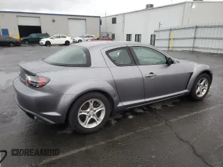 2005 Mazda RX-8 with VIN JM1FE17N050156100, listed as a Copart auction lot 84370154 with 76,054 mi miles and Salvage Title. Bid and sale history available at carsss.com. Image 3.