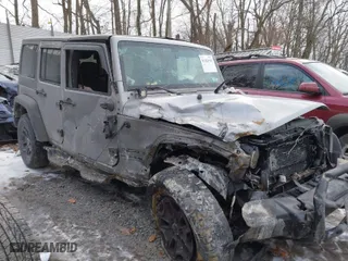 2014 Jeep Wrangler Unlimited Sport with VIN 1C4HJWDG1EL302087, listed as a IAAI auction lot 41420740 with 152,096 mi miles. Bid and sale history available at carsss.com. Image 1.
