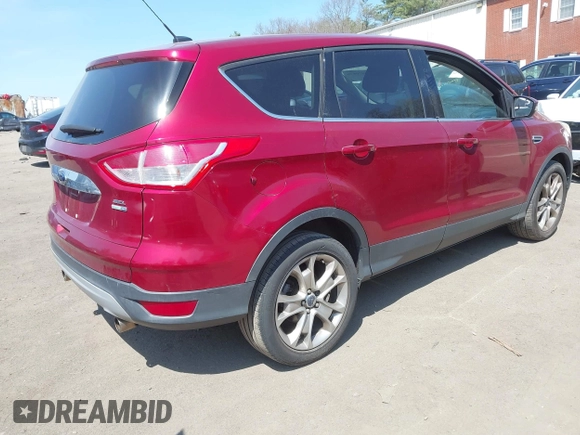 2013 Ford Escape SEL with VIN 1FMCU9H92DUD25669, listed as a IAAI auction lot 42070876 with 133,613 mi miles. Bid and sale history available at carsss.com. Image 4.