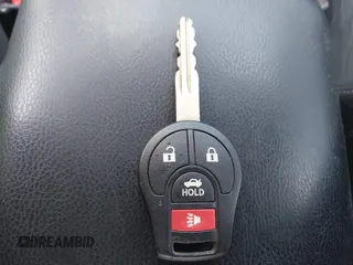 2014 Nissan Sentra S with VIN 3N1AB7AP3EY220784, listed as a IAAI auction lot 42220590 with 148,510 mi miles and . Bid and sale history available at DreamBid. Image 11.
