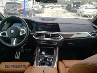2022 BMW X5 xDrive40i with VIN 5UXCR6C01N9M04752, listed as a Copart auction lot 67649712 with 8,831 mi miles. Bid and sale history available at carsss.com. Image 8.