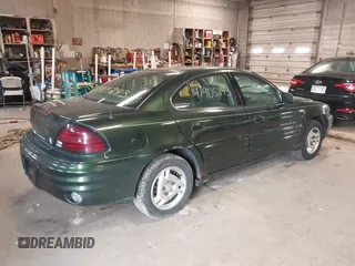 2000 Pontiac Grand Am SE1 with VIN 1G2NF52T6YC546633, listed as a IAAI auction lot 41905243 with 118,017 mi miles. Bid and sale history available at carsss.com. Image 4.