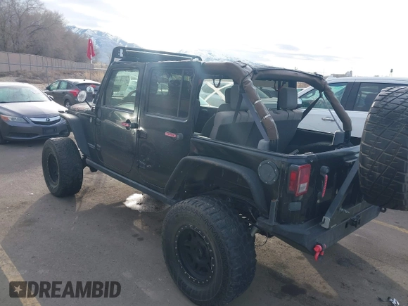 2009 Jeep Wrangler Unlimited Rubicon z VIN 1J4GA69159L749215, wystawiony jako IAAI lot #41489893 z przebiegiem 177 768 mil mil oraz . Historia ofert i sprzedaży dostępna na DreamBid. Obrazek 3.
