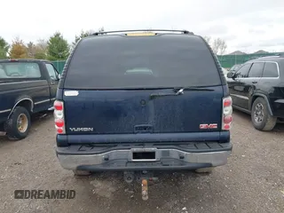 2005 GMC Yukon SLT with VIN 1GKEC13T45J139885, listed as a IAAI auction lot 41796394 with 229,494 mi miles. Bid and sale history available at carsss.com. Image 16.