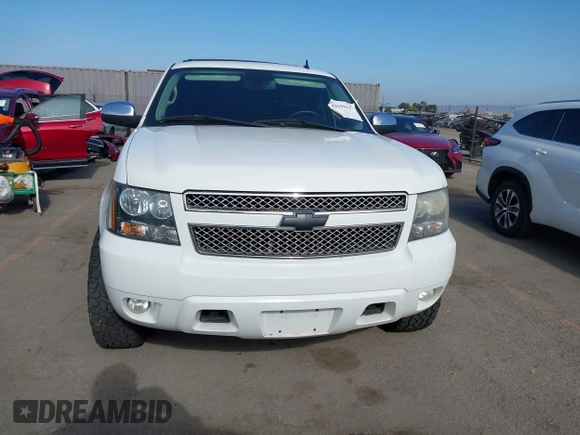 2011 Chevrolet Tahoe LT with VIN 1GNSCBE0XBR374156, listed as a IAAI auction lot 42659337 with 201,514 mi miles and . Bid and sale history available at DreamBid. Image 12.