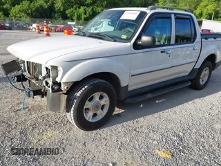 2003 Ford Explorer Sport Trac XLS z VIN 1FMZU77E33UA26042, wystawiony jako IAAI lot #42524905 z przebiegiem 124 878 mil mil oraz . Historia ofert i sprzedaży dostępna na DreamBid. Obrazek 17.