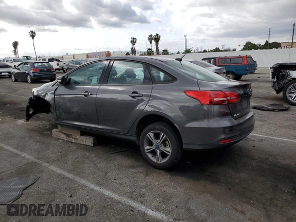 2017 Ford Focus SE with VIN 1FADP3FE3HL235896, listed as a Copart auction lot 50910975 with 74,502 mi miles and Salvage Title. Bid and sale history available at carsss.com. Image 2.