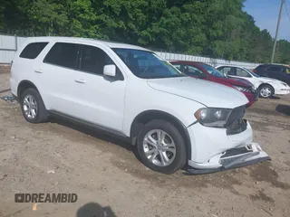 2013 Dodge Durango SXT with VIN 1C4RDHAG0DC698667, listed as a IAAI auction lot 42128418 with 184,060 mi miles and . Bid and sale history available at DreamBid. Image 1.