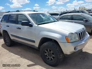 2005 Jeep Grand Cherokee Laredo with VIN 1J4GR48K15C542354, listed as a IAAI auction lot 41940355 with 158,065 mi miles. Bid and sale history available at carsss.com. Image 1.