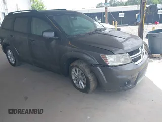 2014 Dodge Journey SXT with VIN 3C4PDCBB3ET144042, listed as a IAAI auction lot 42095860 with 154,847 mi miles. Bid and sale history available at carsss.com. Image 1.