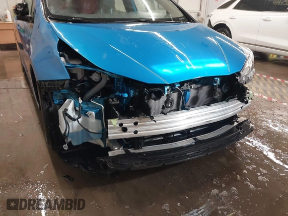 2021 Toyota Prius L Eco with VIN JTDKAMFU9M3135117, listed as a IAAI auction lot 41579736 with 35,795 mi miles and . Bid and sale history available at DreamBid. Image 6.