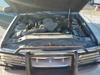1997 Ford Explorer XL with VIN 1FMDU34E5VZB40878, listed as a Copart auction lot 84009744 with 185,047 mi miles and Salvage title. Bid and sale history available at DreamBid. Image 12.